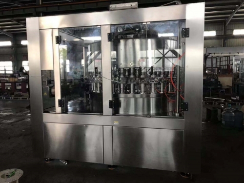 Máy chiết rót nóng và ghép mí cho lon 32 đầu chiết
